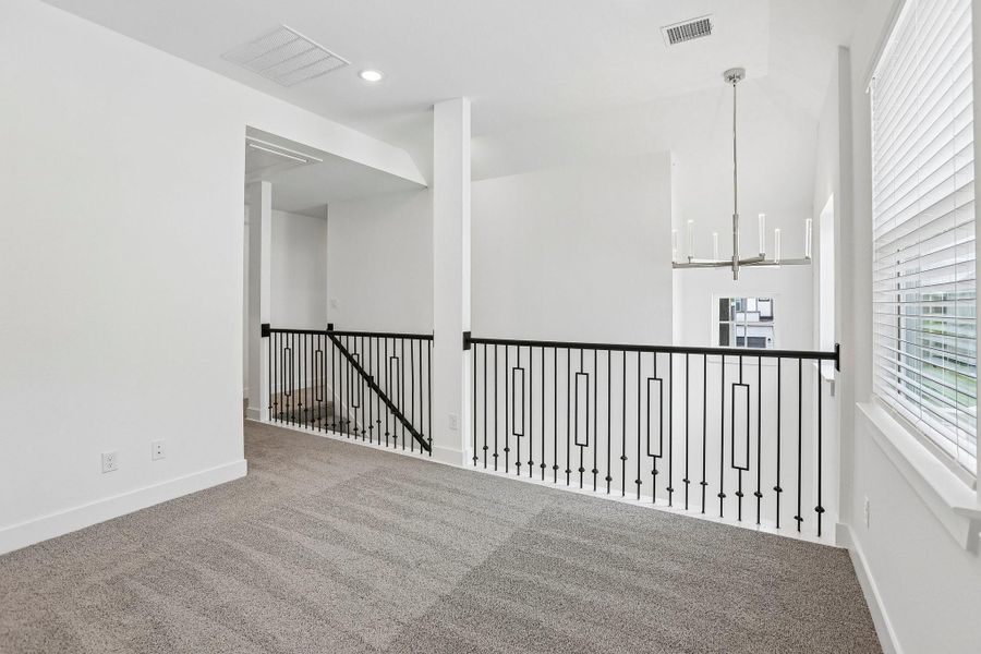 Spacious, unfurnished interior of a new home in Sienna 45', Missouri City (Image 36).