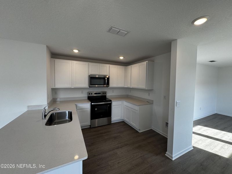 Furnished interior view inside a new home in Copes Landing, Jacksonville (Image 18).