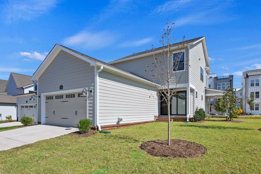 Representative exterior details of a home built from the The Chennault by David Weekley Homes in The River District - Pioneer Collection, Charlotte (Image 4). Representative exterior details of a home built from the The Chennault by David Weekley Homes in The River District - Pioneer Collection, Charlotte (Image 4).