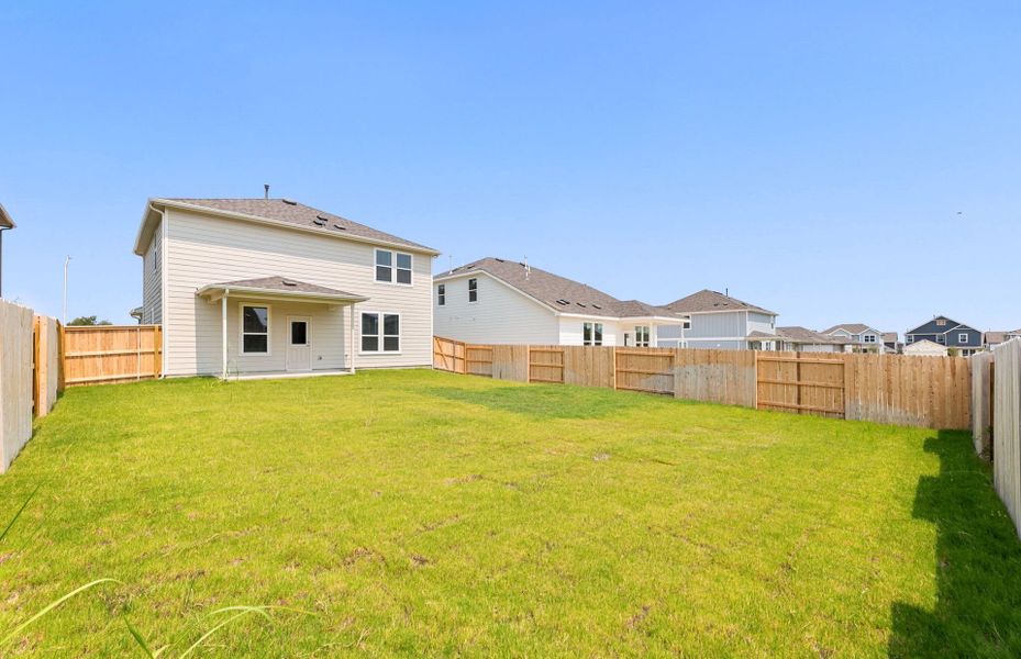 Exterior details and patio area of a home in Patterson Ranch, Georgetown (Image 25).