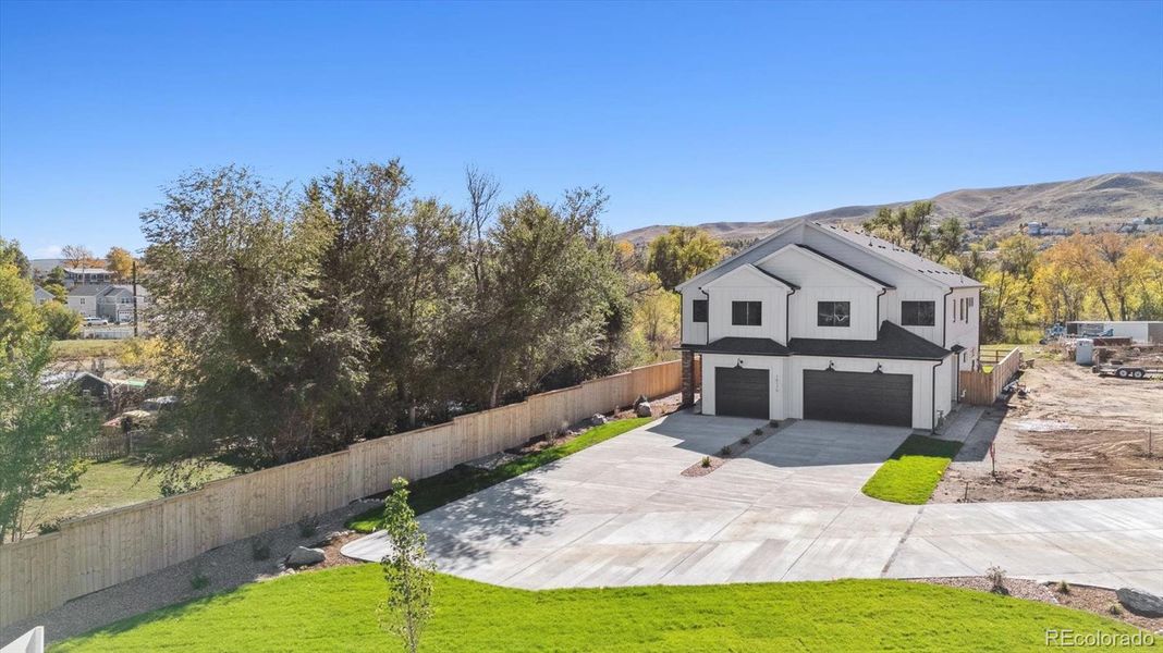 Front exterior of a new home in , Golden, CO, highlighting curb appeal (Image 28).