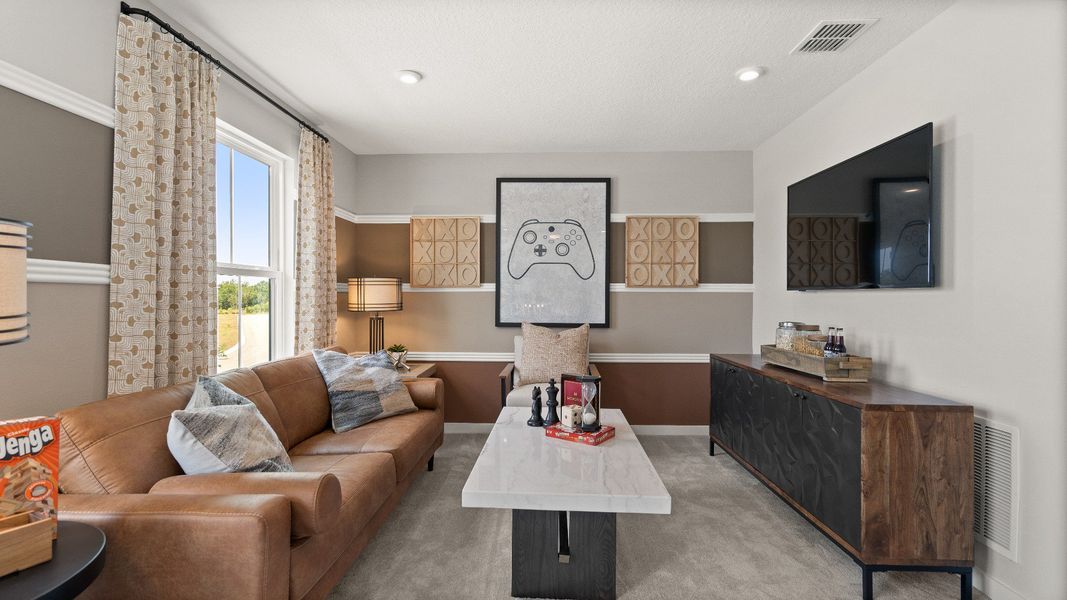 Representative furnished interior of a home built from the Jupiter by DRB Homes in Liberty Trace, Haines City (Image 31).