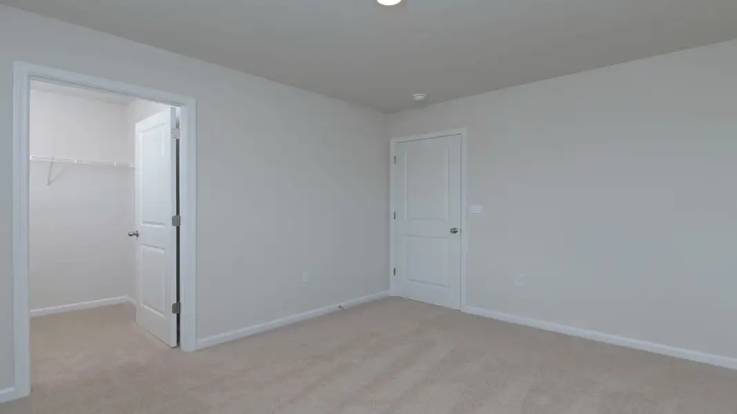 Spacious, unfurnished interior of a new home in Ferry Grove, Lexington (Image 19).
