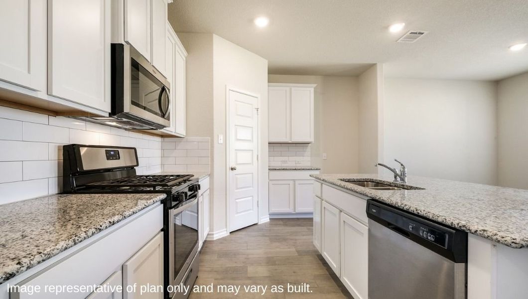 Representative furnished interior of a home built from the The Irvine by D.R. Horton in Veranda, San Antonio (Image 4).