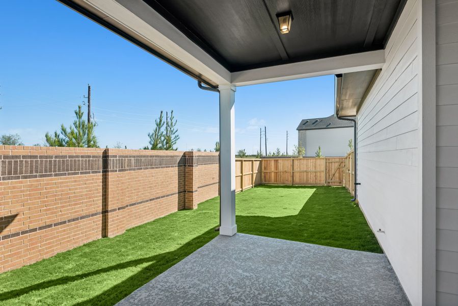 Exterior details and patio area of a home in Elyson 40', Katy (Image 4).