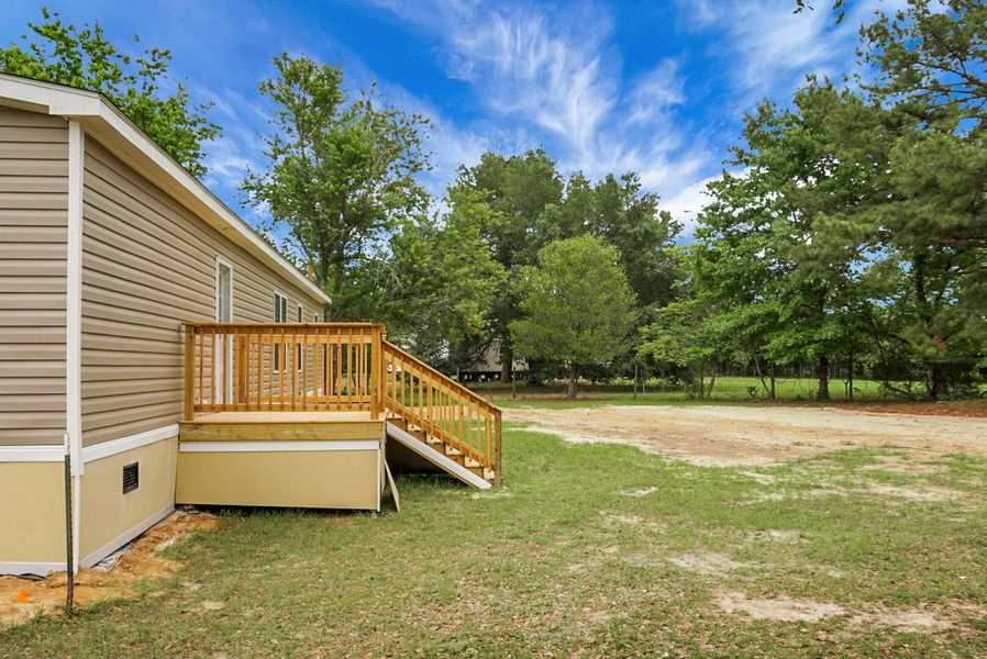 Exterior details and patio area of a home in , Eutawville (Image 25).