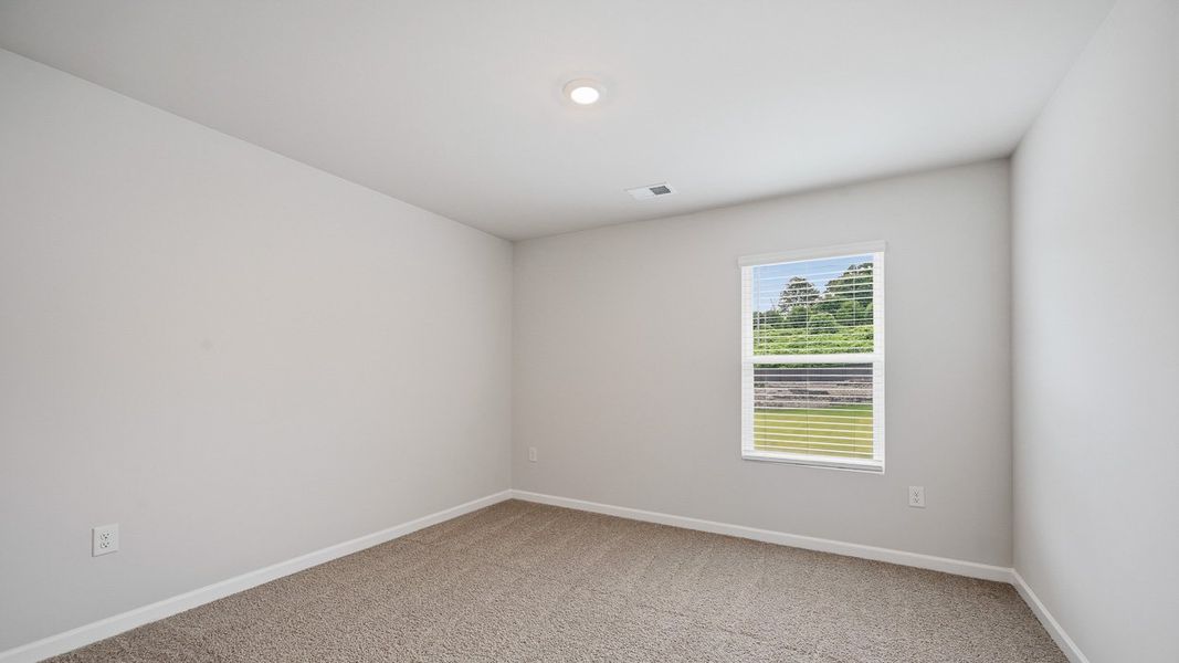 Spacious, unfurnished interior of a new home in Brooks Station, Dacula (Image 18).