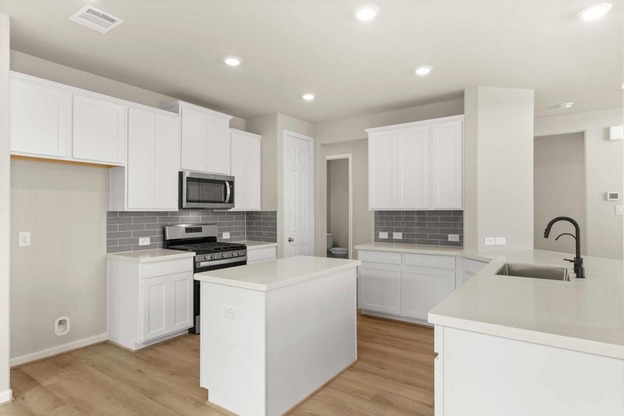 Kitchen. Note: Sample product photo - actual exterior and interior selections may vary by homesite