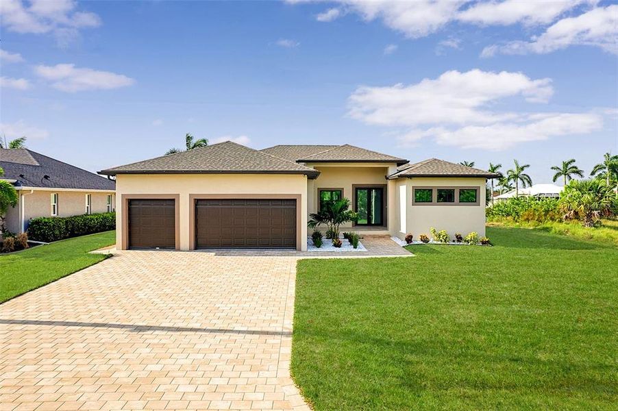Front exterior of a new home in , Port Charlotte, FL, highlighting curb appeal (Image 25).