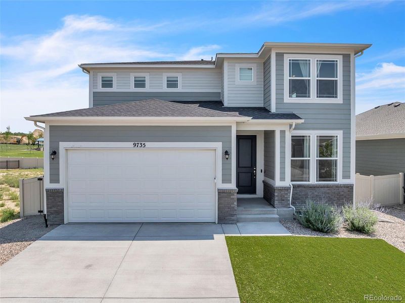 Front exterior of a new home in , Fountain, CO, highlighting curb appeal (Image 28).