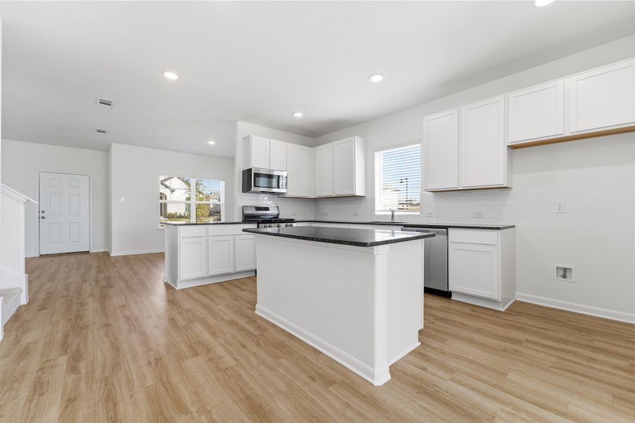 Furnished interior view inside a new home in La Terra, Celina (Image 10).