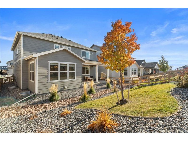Exterior details and patio area of a home in Prairie Song, Windsor (Image 28).