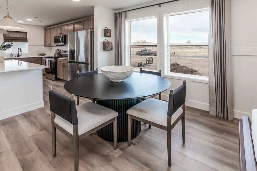 Representative furnished interior of a home built from the Magnolia by Hartford Homes in Prairie Song, Windsor (Image 32).
