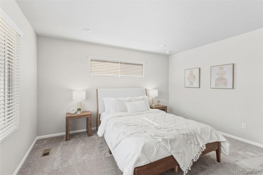 Furnished interior view inside a new home in Woodrose at Painted Prairie, Aurora (Image 7).