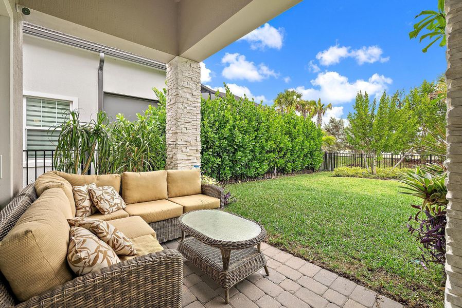 Exterior details and patio area of a home in Avondale at Avenir, Palm Beach Gardens (Image 21).