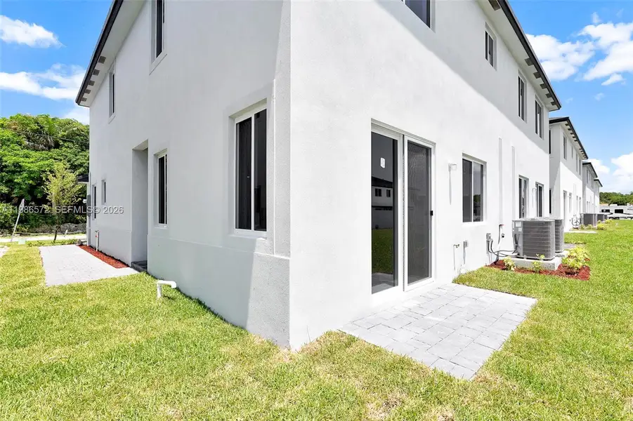 Exterior details and patio area of a home in , Miami (Image 3).