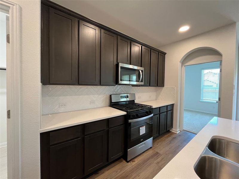 Furnished interior view inside a new home in Wellspring, Round Rock (Image 9). Furnished interior view inside a new home in Wellspring, Round Rock (Image 9).