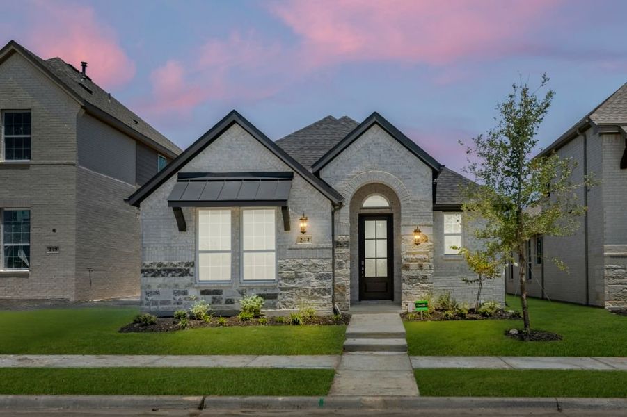 Representative exterior photo of a completed home built from the Cypress by UnionMain Homes in Edgewater, Fate, TX (Image 24).