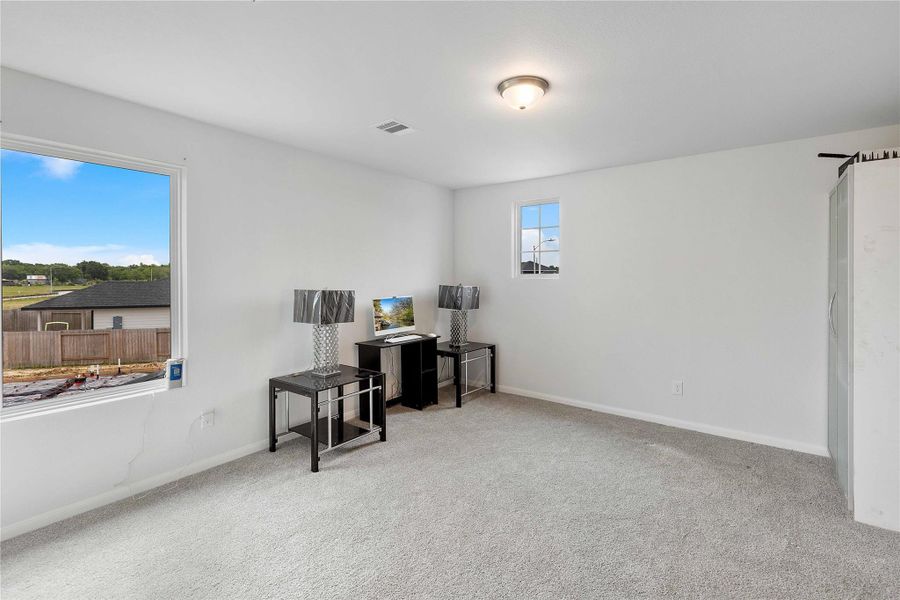 Furnished interior view inside a new home in Sweetgrass Village, Crosby (Image 18).