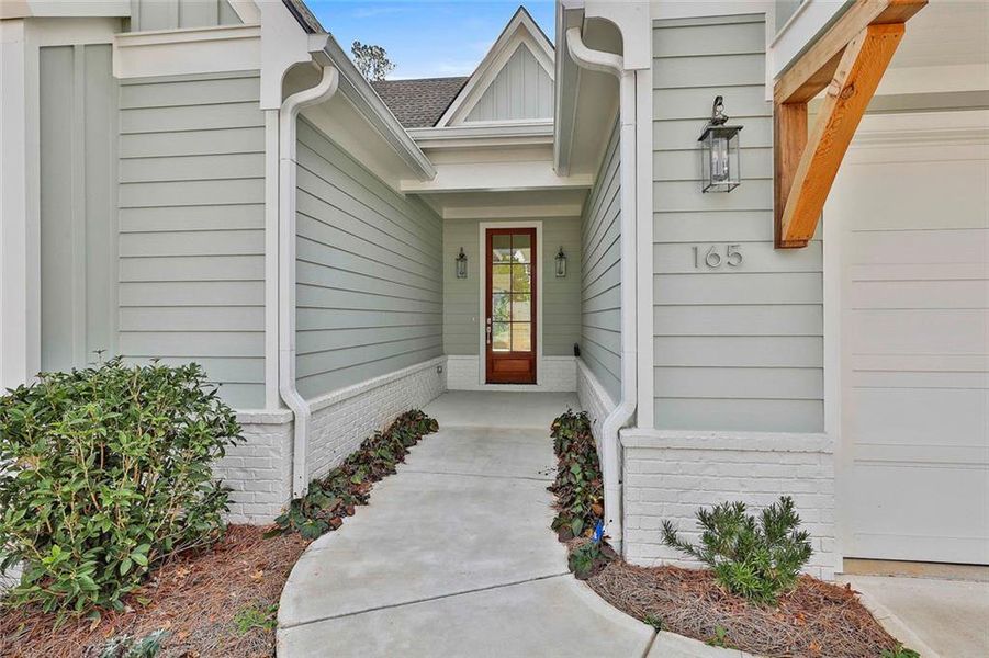 Exterior details and patio area of a home in Gardens at Arbor Springs, Newnan (Image 29).