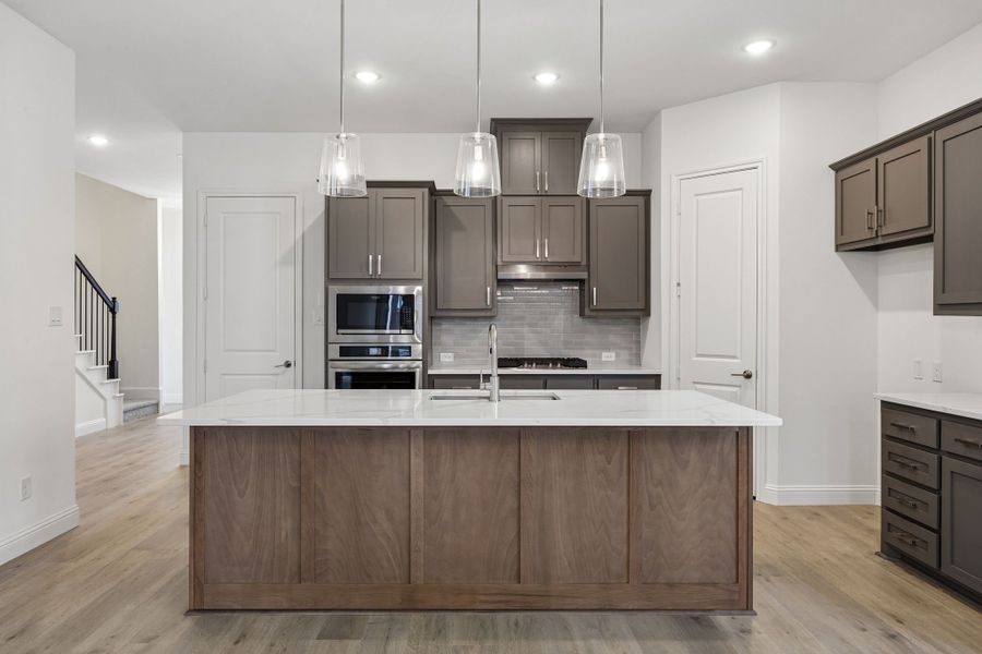 Furnished interior view inside a new home in Country Lakes, Denton (Image 7).