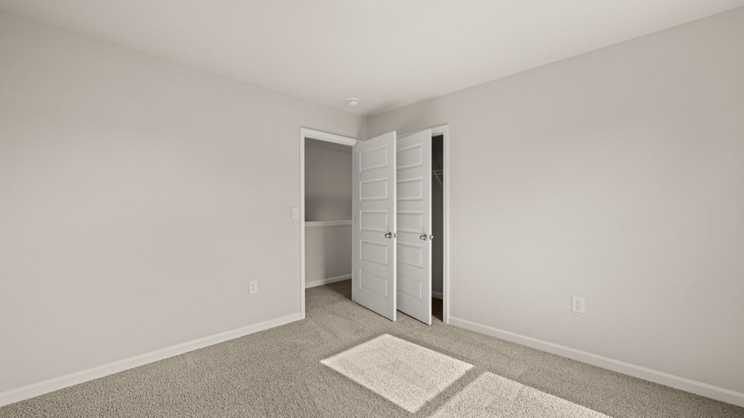 Spacious, unfurnished interior of a new home in The Reserve at Calcutta, Stockbridge (Image 23).