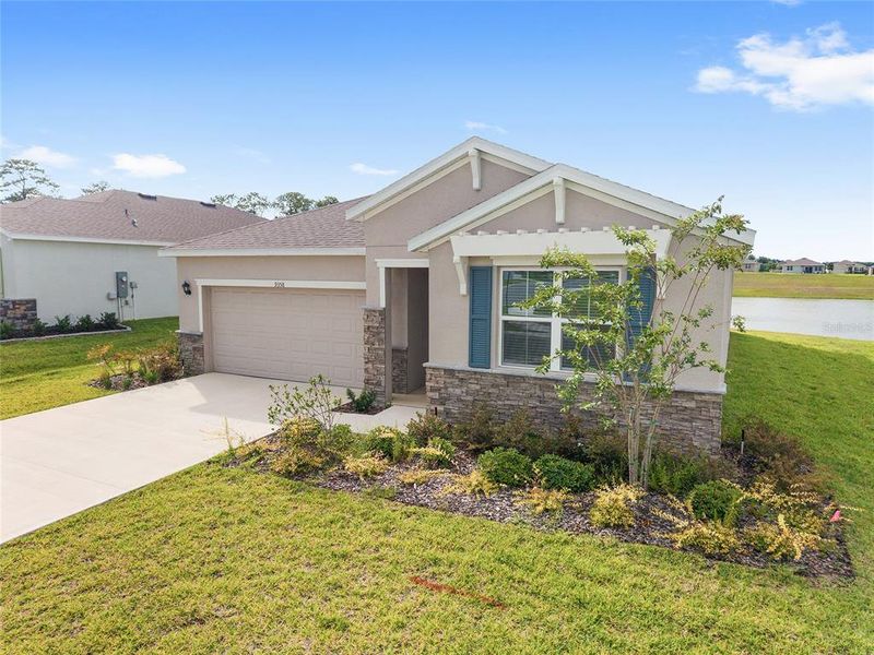 Front exterior of a new home in JB Ranch, Ocala, FL, highlighting curb appeal (Image 1). Front exterior of a new home in JB Ranch, Ocala, FL, highlighting curb appeal (Image 1).