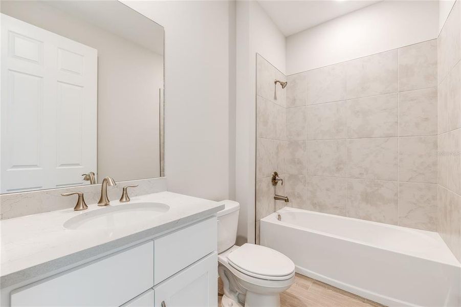 Furnished interior view inside a new home in Coral Lakes - Tradition & Express, Punta Gorda (Image 7).