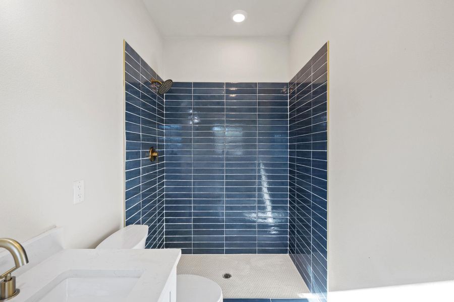 Full bathroom with a shower stall and vanity Full bathroom with a shower stall and vanity