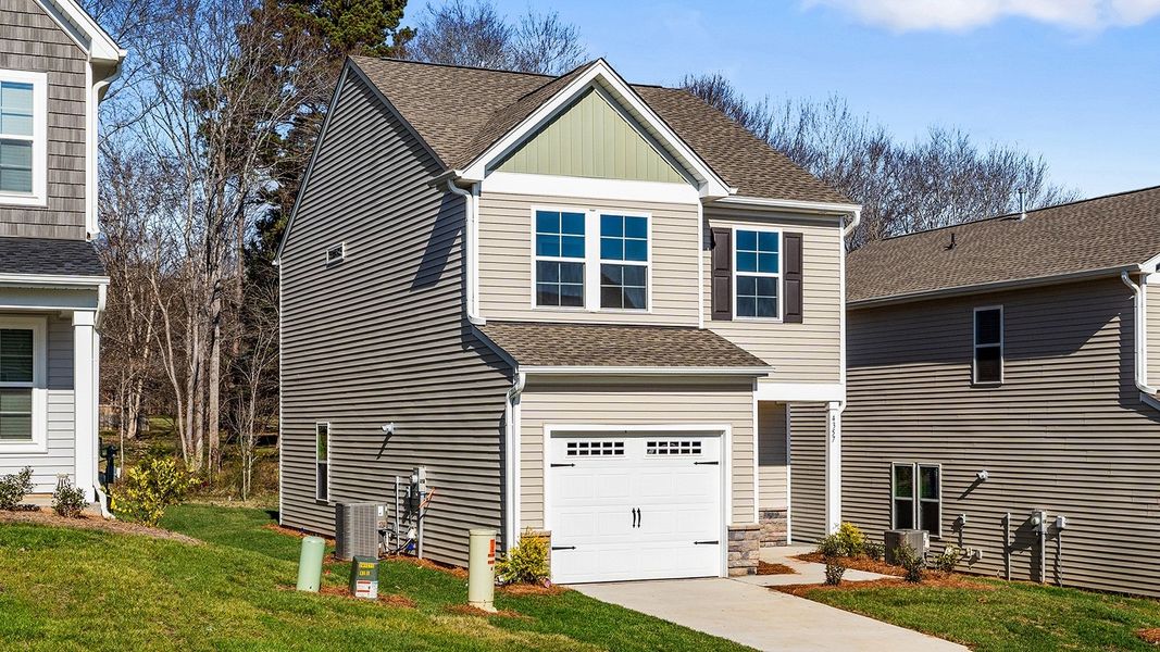 Front exterior of a new home in Hanes Lake, Winston-Salem, NC, highlighting curb appeal (Image 22).