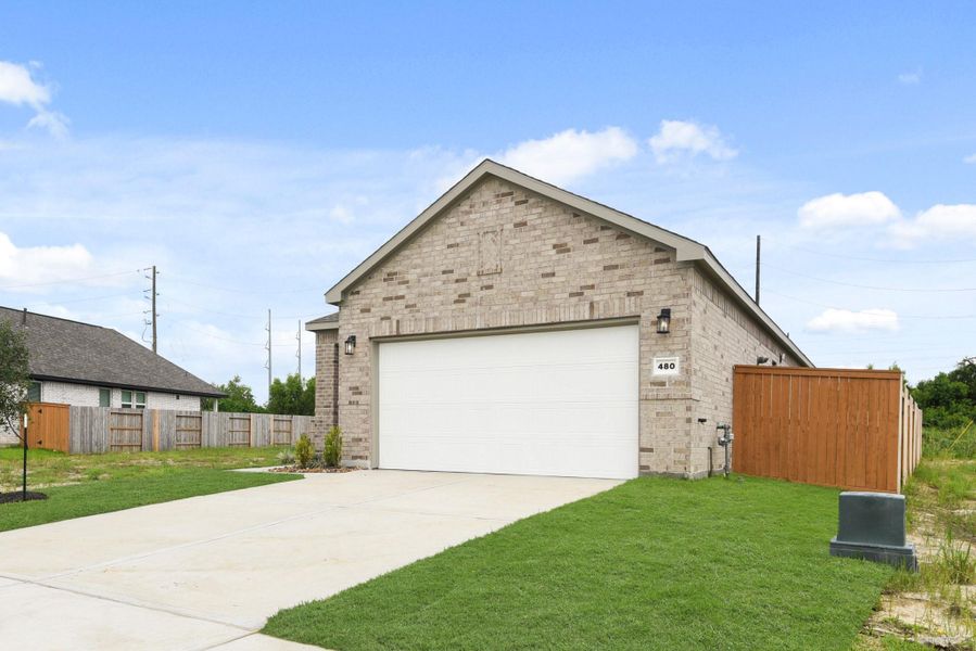 Front exterior of a new home in River Ranch Trails, Dayton, TX, highlighting curb appeal (Image 16). Front exterior of a new home in River Ranch Trails, Dayton, TX, highlighting curb appeal (Image 16).
