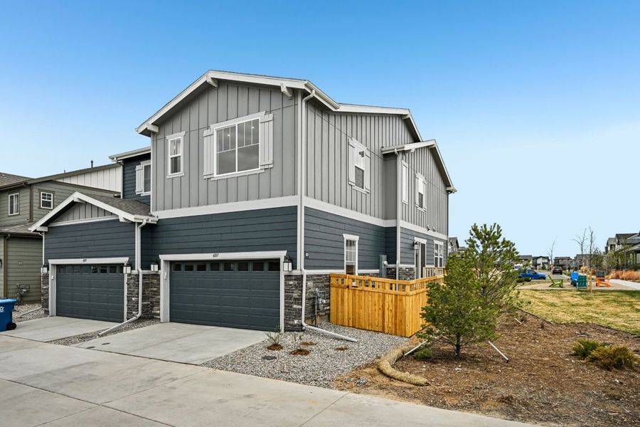 Front exterior of a new home in Painted Prairie Villas, Aurora, CO, highlighting curb appeal (Image 2). Front exterior of a new home in Painted Prairie Villas, Aurora, CO, highlighting curb appeal (Image 2).