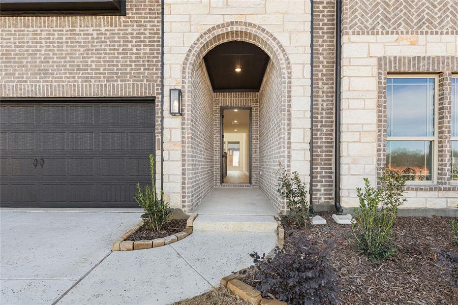 Exterior details and patio area of a home in Creekview Meadows, Pilot Point (Image 3).