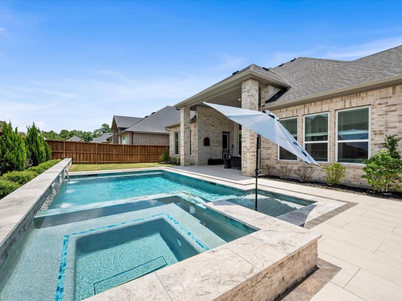 Exterior details and patio area of a home in , Spring (Image 28).