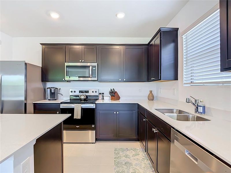 Furnished interior view inside a new home in Caloosa Cove, Labelle (Image 13).