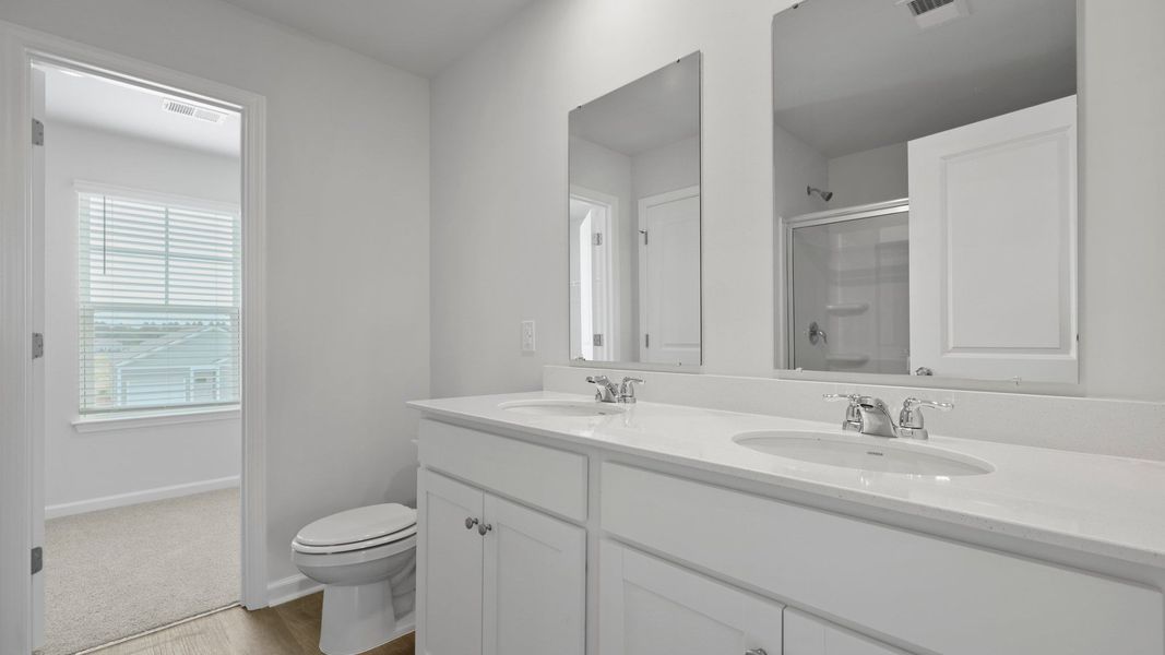 Representative furnished interior of a home built from the BRANDON by D.R. Horton in Hillcrest, Ravenel (Image 12).