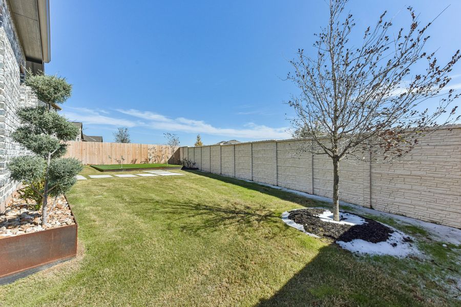Exterior details and patio area of a home in The Grove at Blackhawk, Pflugerville (Image 36).