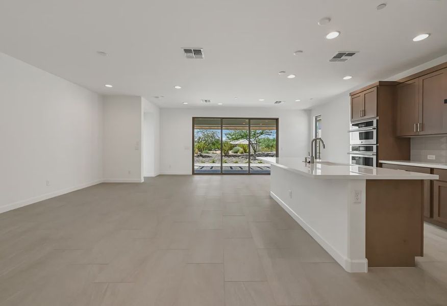 Trilogy Verde River Valletta HS 982 Great Room - 12 of 18 Trilogy Verde River Valletta HS 982 Great Room - 12 of 18