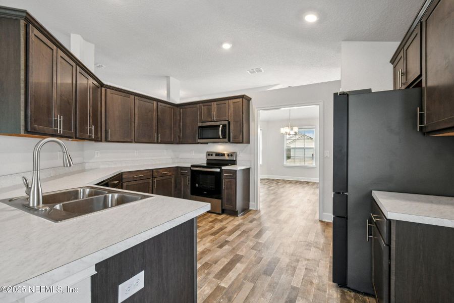 Furnished interior view inside a new home in , Jacksonville (Image 3). Furnished interior view inside a new home in , Jacksonville (Image 3).