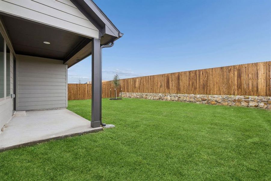 Patio in the Oscar home plan by Trophy Signature Homes – REPRESENTATIVE PHOTO