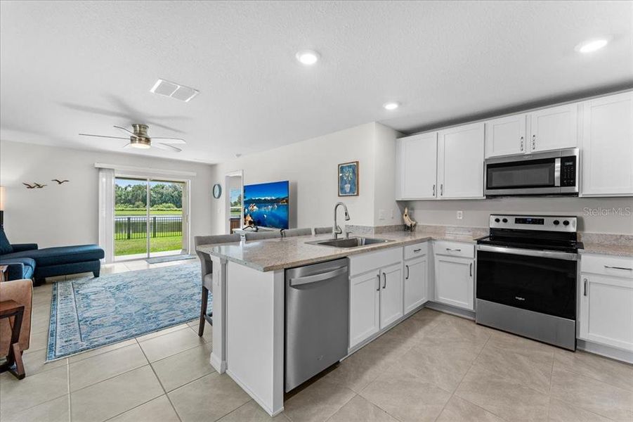 Furnished interior view inside a new home in Bella Lago, Parrish (Image 6).