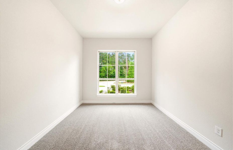 Spacious, unfurnished interior of a new home in The Woodlands Hills 65′, Willis (Image 38).