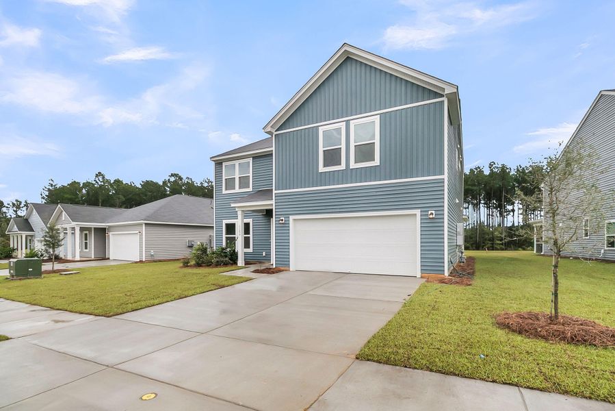 Front exterior of a new home in Watson Hill, Summerville, SC, highlighting curb appeal (Image 25).