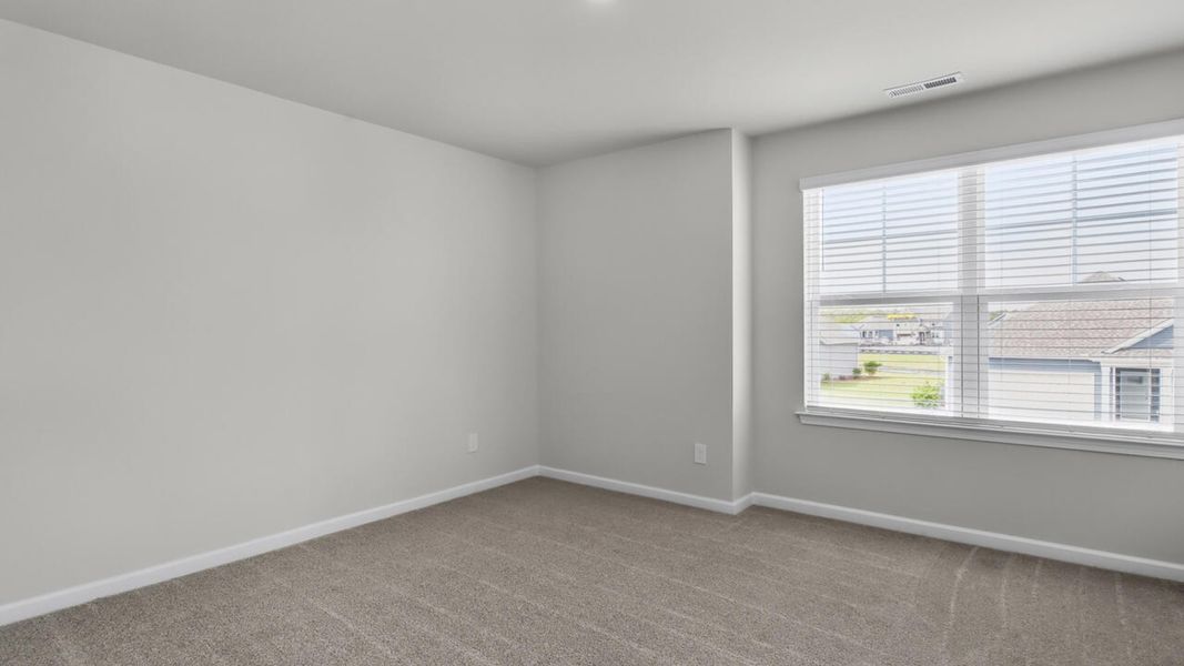 Spacious, unfurnished interior of a new home in Magnolia Ridge at Blake Farm, Wilmington (Image 36).