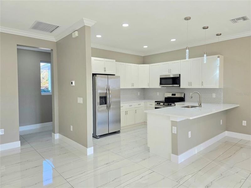 Furnished interior view inside a new home in , Lehigh Acres (Image 5). Furnished interior view inside a new home in , Lehigh Acres (Image 5).