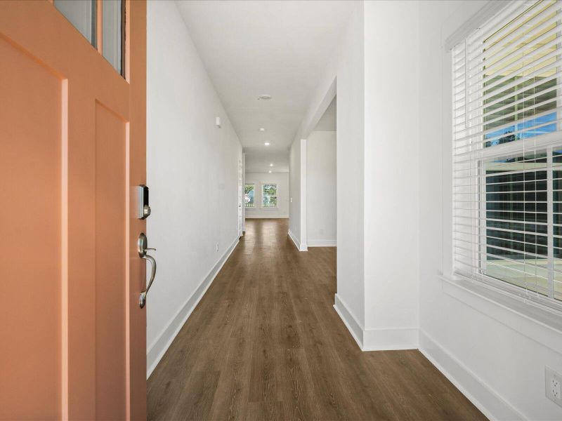 Spacious, unfurnished interior of a new home in The Coves at Lakes of Cane Bay, Summerville (Image 12). Spacious, unfurnished interior of a new home in The Coves at Lakes of Cane Bay, Summerville (Image 12).