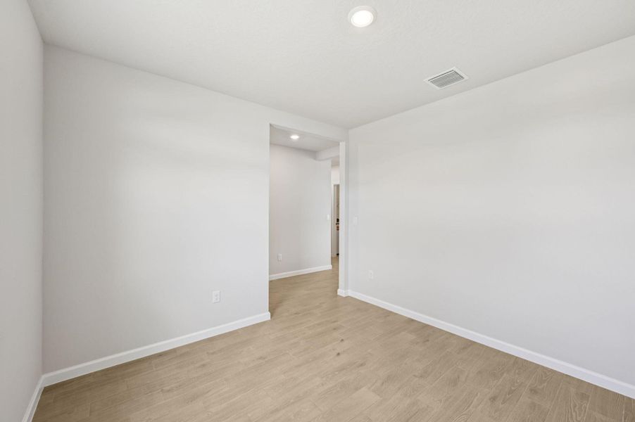 Spacious, unfurnished interior of a new home in Hampton Park - Classic Series, Vero Beach (Image 19). Spacious, unfurnished interior of a new home in Hampton Park - Classic Series, Vero Beach (Image 19).