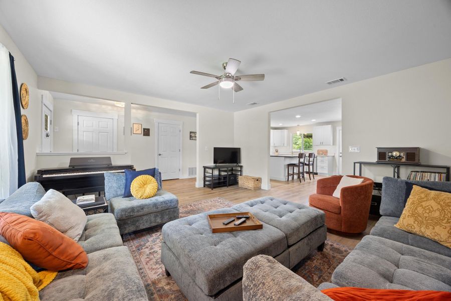 Open to the dining and kitchen, you'll enjoy the cozy living room.