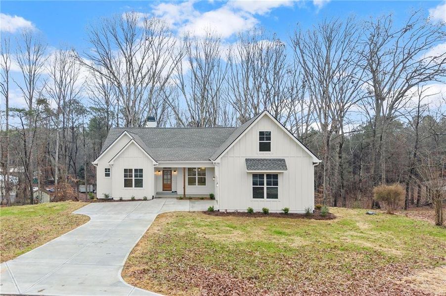 Front exterior of a new home in , Waleska, GA, highlighting curb appeal (Image 24). Front exterior of a new home in , Waleska, GA, highlighting curb appeal (Image 24).