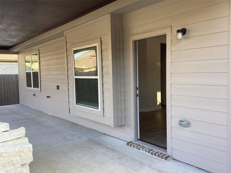 Exterior details and patio area of a home in Willow Trace 45' at Willow Trace, Spring (Image 17).
